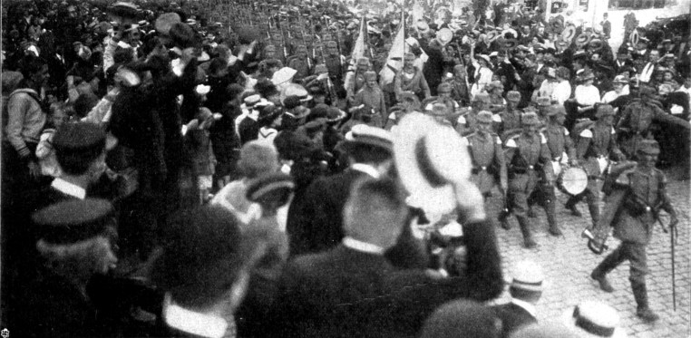 German soldiers being cheered in Lubeck during their advance to the front lines in 1914 during World War I (Wikipedia)