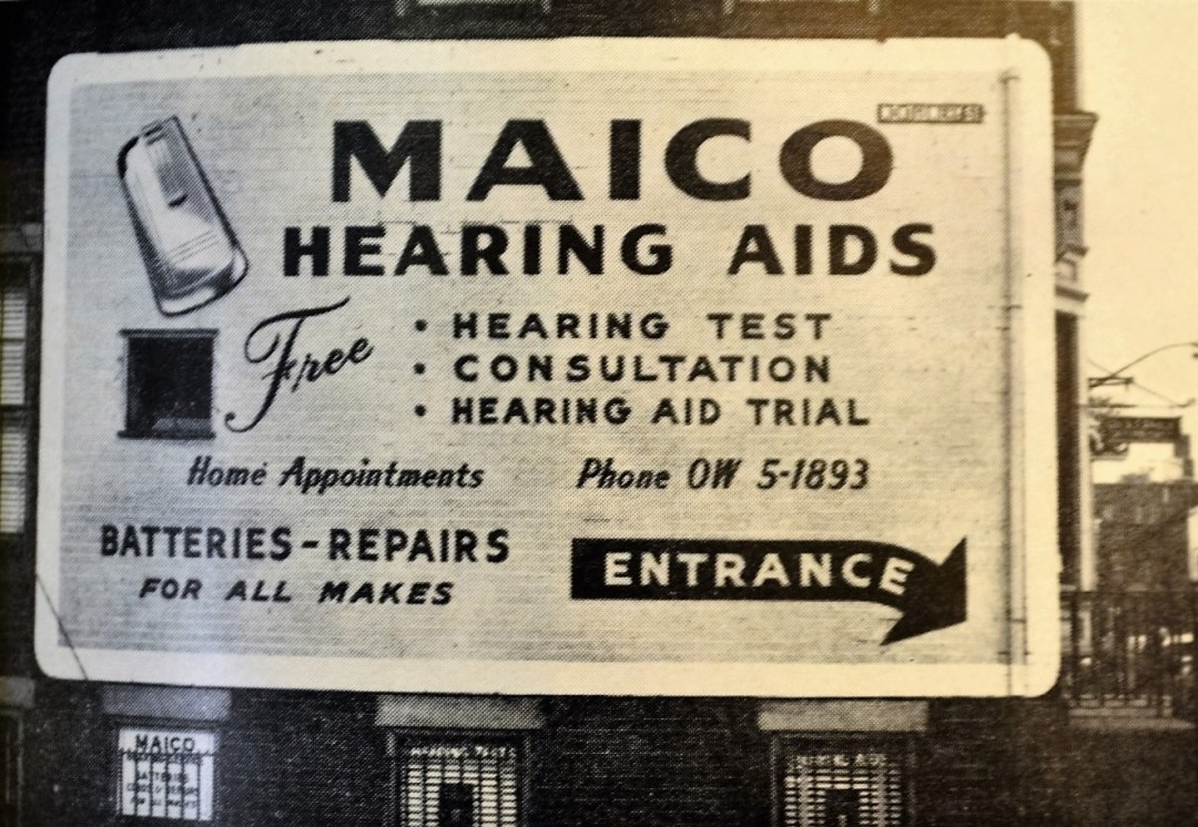 An enormous sign for a Macio Hearing Aids shop in Trenton. The billboard was effective in attracting large numbers of walk-in customers. 